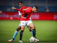 Nasser Maher of the Egypt team battles for possession with Kabelo Seakanyeng of the Botswana team during the Africa Cup of Nations Qualifier...