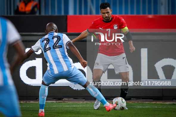 Omar Marmoush of the Egypt team battles for possession with Kabelo Seakanyeng of the Botswana team during the Africa Cup of Nations Qualifie...