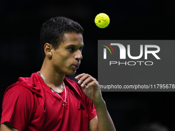 MALAGA, SPAIN - NOVEMBER 20: Gabriel Diallo of Team Canada in his singles match against Daniel Altmaier of Team Germany during the Quarter-F...