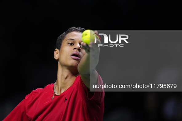 MALAGA, SPAIN - NOVEMBER 20: Gabriel Diallo of Team Canada in his singles match against Daniel Altmaier of Team Germany during the Quarter-F...