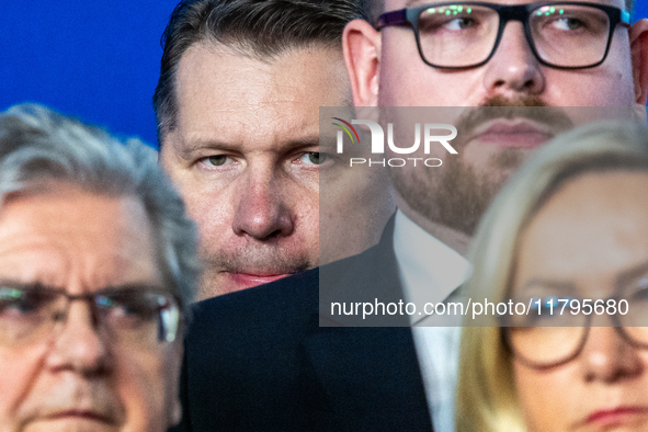 Przemyslaw Czarnek (C) member of the Law and Justice party,  during a press conference on party finances in Warsaw, Poland, on November 19,...