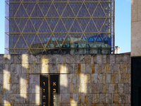 This image shows the outer portal wall of the Ohel Jakob Synagogue on St. Jakob's Square in Munich, Germany, on January 7, 2023. The golden...