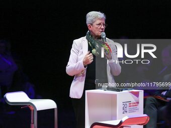 French Minister of Health and Access to Care Genevieve Darrieussecq delivers a speech during the 106th session of the Congress of Mayors org...