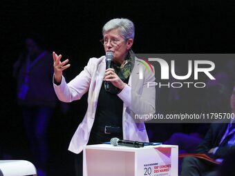 French Minister of Health and Access to Care Genevieve Darrieussecq delivers a speech during the 106th session of the Congress of Mayors org...