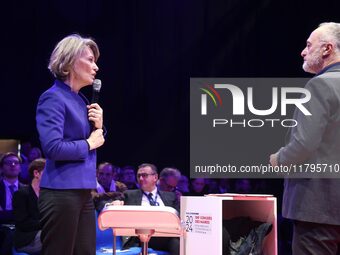 France's Minister of Education Anne Genetet (L) delivers a speech during the 106th session of the Congress of Mayors organized by the ''Fran...