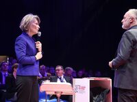 France's Minister of Education Anne Genetet (L) delivers a speech during the 106th session of the Congress of Mayors organized by the ''Fran...