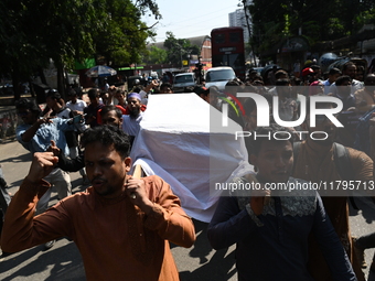 Activists from an anti-fascist student group held a symbolic coffin procession at Dhaka University campus in Dhaka, Bangladesh, on November...