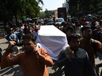 Activists from an anti-fascist student group held a symbolic coffin procession at Dhaka University campus in Dhaka, Bangladesh, on November...