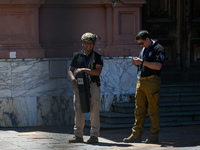 Security officers guard the arrival of Italian Prime Minister Giorgia Meloni at La Casa Rosada in Buenos Aires, Argentina, on November 20, 2...