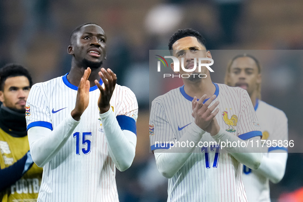 Ibrahima Konate' of France and William Saliba greet the fans at the end of the UEFA Nations League 2024/25 League A Group 2 match between It...