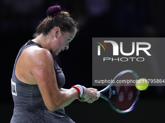 MALAGA, SPAIN - NOVEMBER 19:  Viktoria Hruncakova of Slovakia in her singles match against Lucia Bronzetti of Team Italy in the final tie be...