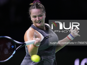 MALAGA, SPAIN - NOVEMBER 19:  Viktoria Hruncakova of Slovakia in her singles match against Lucia Bronzetti of Team Italy in the final tie be...