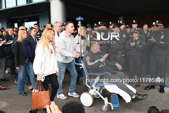 36-year-old, 7-year veteran New York City Police Department Officer Rich Wong is released from Jamaica Hospital after being shot in Jamaica,...