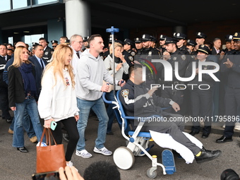 36-year-old, 7-year veteran New York City Police Department Officer Rich Wong is released from Jamaica Hospital after being shot in Jamaica,...