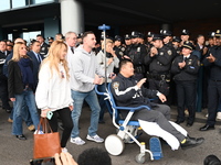 36-year-old, 7-year veteran New York City Police Department Officer Rich Wong is released from Jamaica Hospital after being shot in Jamaica,...