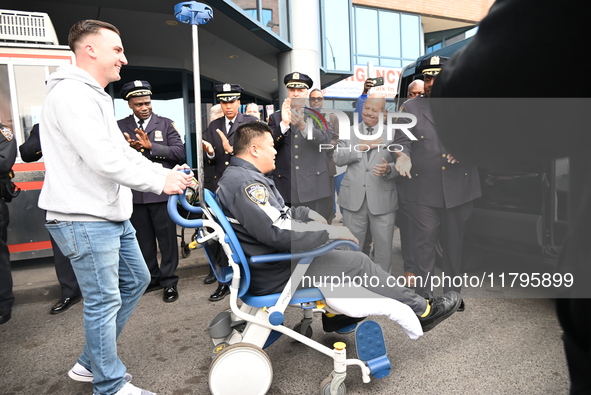 36-year-old, 7-year veteran New York City Police Department Officer Rich Wong is released from Jamaica Hospital after being shot in Jamaica,...