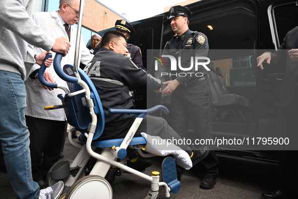 36-year-old, 7-year veteran New York City Police Department Officer Rich Wong is released from Jamaica Hospital after being shot in Jamaica,...