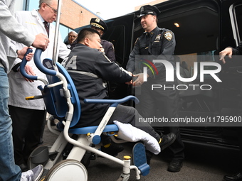 36-year-old, 7-year veteran New York City Police Department Officer Rich Wong is released from Jamaica Hospital after being shot in Jamaica,...