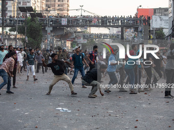 A clash erupts between students of Dhaka College and City College at Dhaka's Science Lab intersection in Dhaka, Bangladesh, on November 20,...