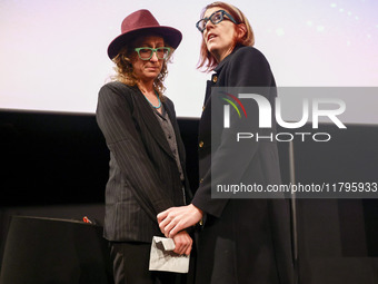 Cinematographer Bianca Cline and Rachel Mason, a friend of Halyna Hutchins, share a moment while attending the world premiere of  ' Rust ' f...