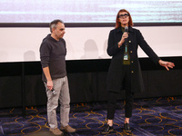 Cinematographer Bianca Cline and director Joel Souza attend the world premiere of  ' Rust ' film during the 32nd International Film Festival...