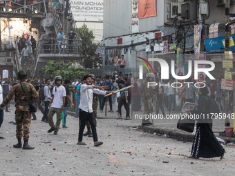 A clash erupts between students of Dhaka College and City College at Dhaka's Science Lab intersection in Dhaka, Bangladesh, on November 20,...