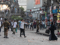 A clash erupts between students of Dhaka College and City College at Dhaka's Science Lab intersection in Dhaka, Bangladesh, on November 20,...