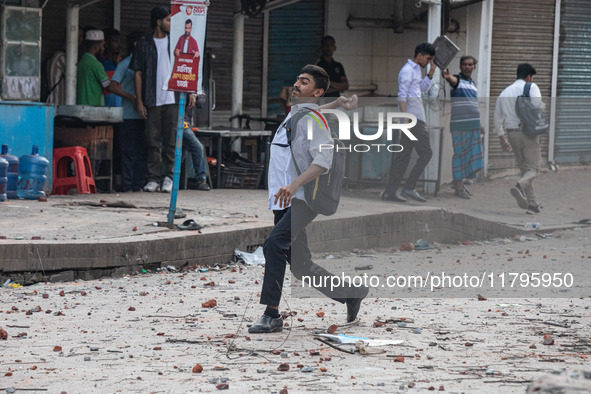 A clash erupts between students of Dhaka College and City College at Dhaka's Science Lab intersection in Dhaka, Bangladesh, on November 20,...