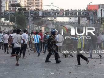 A clash erupts between students of Dhaka College and City College at Dhaka's Science Lab intersection in Dhaka, Bangladesh, on November 20,...