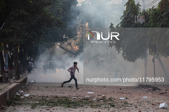 A clash erupts between students of Dhaka College and City College at Dhaka's Science Lab intersection in Dhaka, Bangladesh, on November 20,...