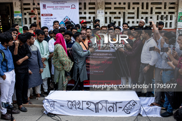 A few people organize a coffin procession at Dhaka University demanding a ban on the Bangladesh Awami League and their associated parties, i...