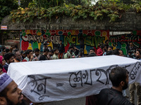 A few people organize a coffin procession at Dhaka University demanding a ban on the Bangladesh Awami League and their associated parties, i...