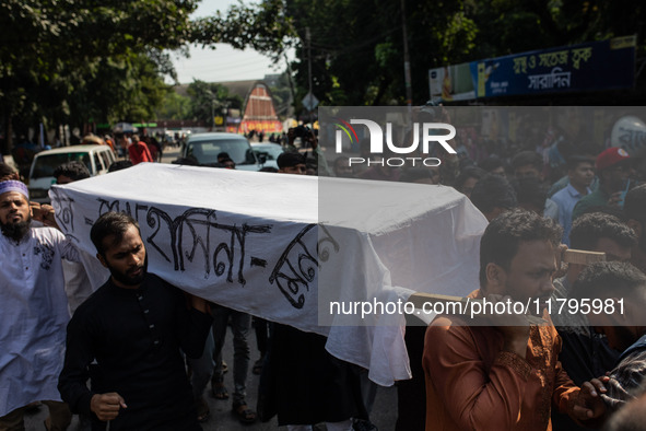 A few people organize a coffin procession at Dhaka University demanding a ban on the Bangladesh Awami League and their associated parties, i...