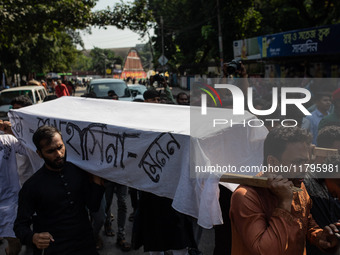 A few people organize a coffin procession at Dhaka University demanding a ban on the Bangladesh Awami League and their associated parties, i...