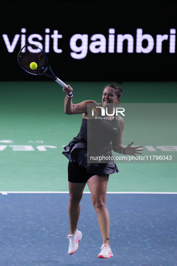 MALAGA, SPAIN - NOVEMBER 19:  Viktoria Hruncakova of Slovakia in her singles match against Lucia Bronzetti of Team Italy in the final tie be...