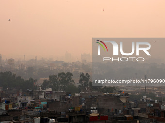 Fog engulfs the city skyline in Jaipur, Rajasthan, India, on November 20, 2024. (