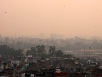 Fog engulfs the city skyline in Jaipur, Rajasthan, India, on November 20, 2024. (