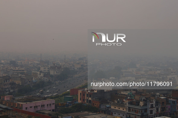 Fog engulfs the city skyline in Jaipur, Rajasthan, India, on November 20, 2024. 