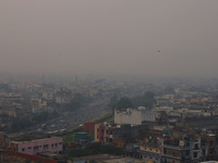 Fog engulfs the city skyline in Jaipur, Rajasthan, India, on November 20, 2024. (