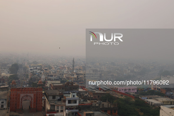 Fog engulfs the city skyline in Jaipur, Rajasthan, India, on November 20, 2024. 