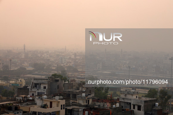 Fog engulfs the city skyline in Jaipur, Rajasthan, India, on November 20, 2024. 