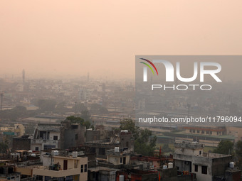 Fog engulfs the city skyline in Jaipur, Rajasthan, India, on November 20, 2024. (