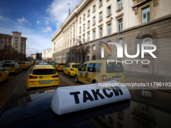 Bulgarian taxi drivers block Tsar Osvoboditel Boulevard with their cars to protest against plans for higher transport insurance tariffs in S...