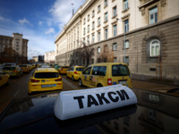 Bulgarian taxi drivers block Tsar Osvoboditel Boulevard with their cars to protest against plans for higher transport insurance tariffs in S...