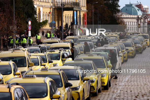 Bulgarian taxi drivers block Tsar Osvoboditel Boulevard with their cars to protest against plans for higher transport insurance tariffs in S...