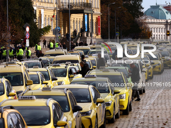 Bulgarian taxi drivers block Tsar Osvoboditel Boulevard with their cars to protest against plans for higher transport insurance tariffs in S...