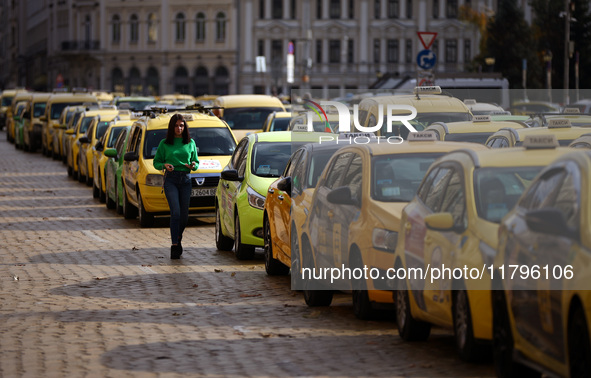 Bulgarian taxi drivers block Tsar Osvoboditel Boulevard with their cars to protest against plans for higher transport insurance tariffs in S...