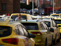 Bulgarian taxi drivers block Tsar Osvoboditel Boulevard with their cars to protest against plans for higher transport insurance tariffs in S...