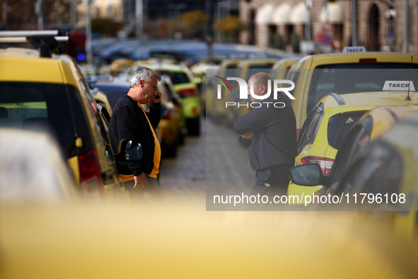 Bulgarian taxi drivers block Tsar Osvoboditel Boulevard with their cars to protest against plans for higher transport insurance tariffs in S...