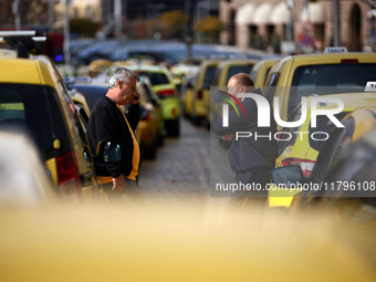 Bulgarian taxi drivers block Tsar Osvoboditel Boulevard with their cars to protest against plans for higher transport insurance tariffs in S...